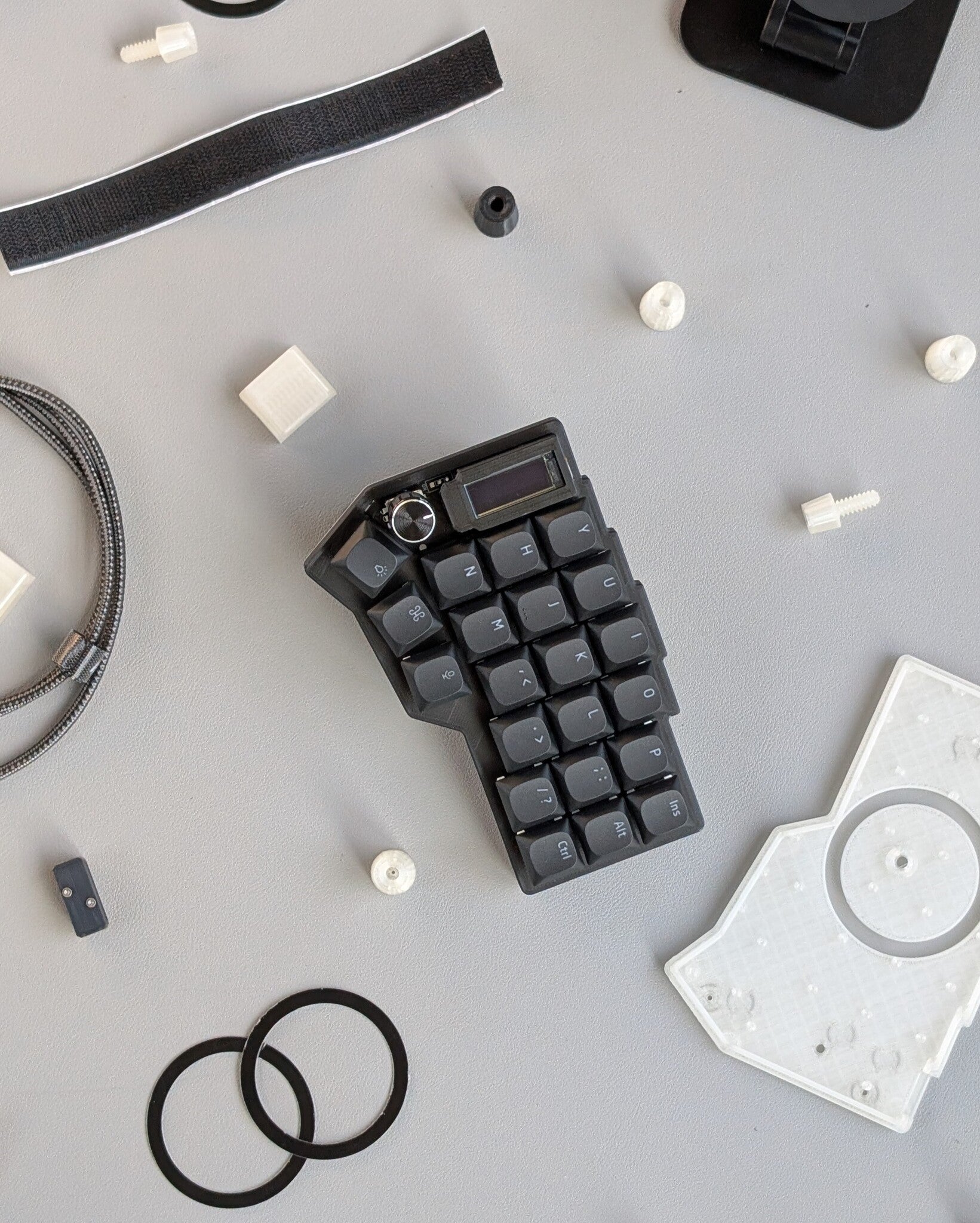 mechanical split keyboard surrounded by keyboard parts